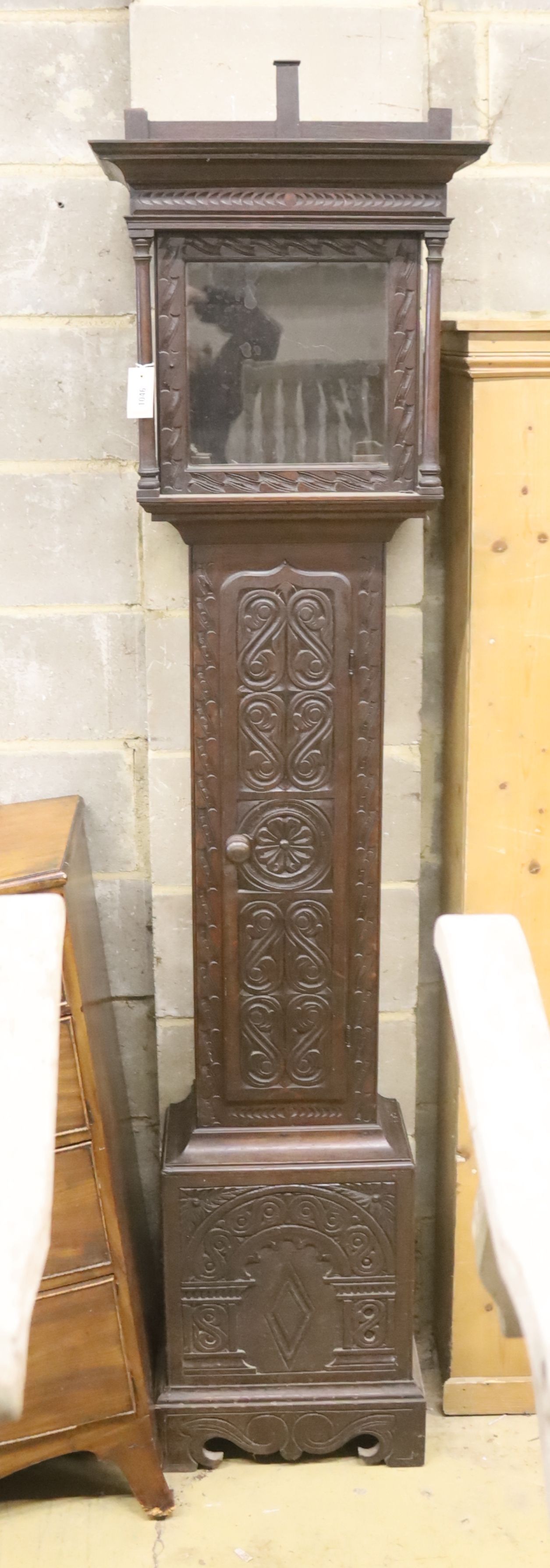 An 18th century style carved oak longcase clock case, height 216cm